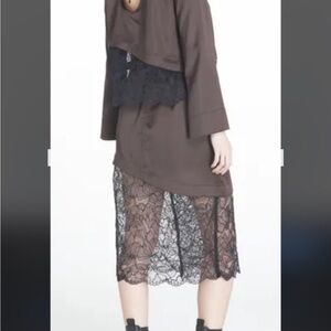 GANNI Elegant Brown Silky Blouse with Black Lace design.